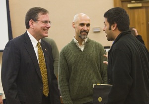 John Sutphen '78 and Ron Cole '87, associate professor of geology, chat with Aarish Riaz '10 at a reception on campus in February 2009 where the O'Brien and Gere Ltd. Russell L. Sutphen Scholarship was presented to Anna Oehser '11.