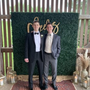 Connor and his brother at a friend's wedding