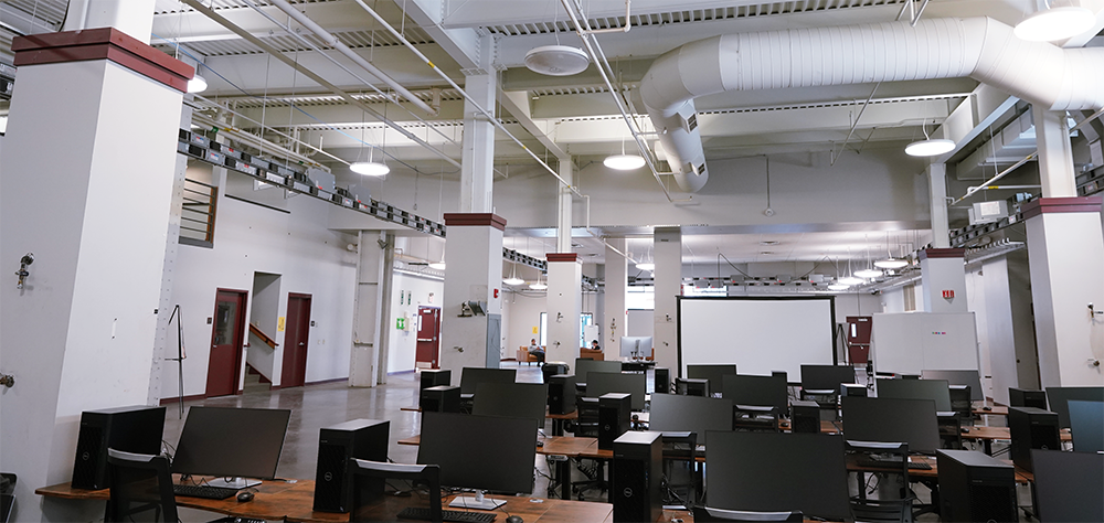 Wide view of first floor with computer lab and open spaces