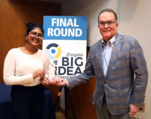 Lance Zingale presenting Hemani Alaparthi with the first prize in the 2026 Zingale Big Idea Competition