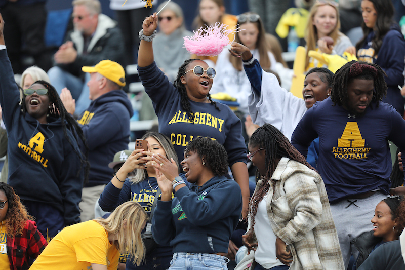 Fans cheer on the Gator football team during Blue & Gold Weekend.