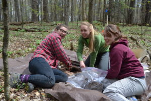 Former Allegheny students assisting with soil collection at the Bousson Environmental Research Reserve. Photo by Rich Bowden.
