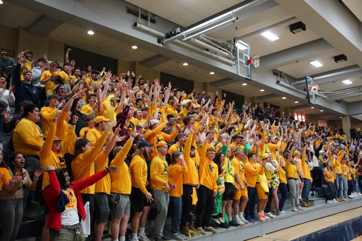 Students cheering for Men's Basketball