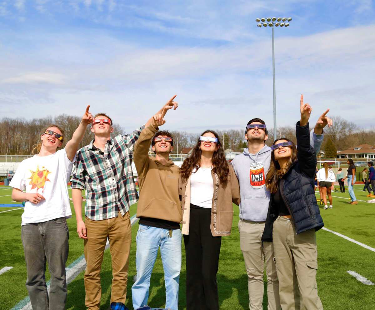 Students with eclipse glasses